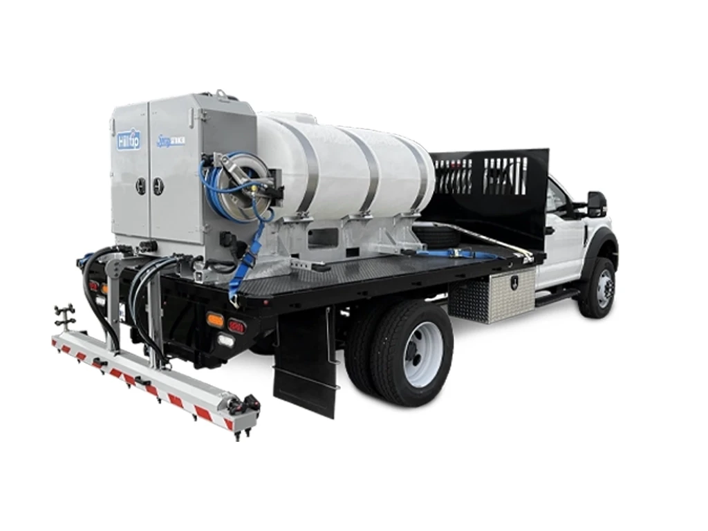 Hilltip SprayStriker Deicing System — Mid-State Truck Equipment Fishers Greenfield IN Hilltip SprayStriker liquid deicing system mounted on a flatbed truck, sold by Mid-State Truck Equipment in Fishers and Greenfield, Indiana