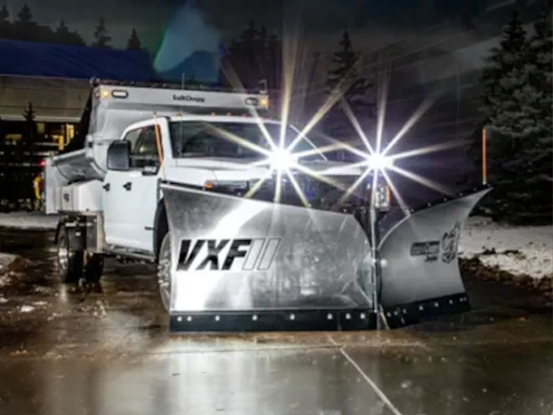 SnowDogg VXF Plows on Two Trucks — Mid-State Truck Equipment Fishers Greenfield IN Two trucks equipped with SnowDogg VXF stainless plows at Mid-State Truck Equipment in Fishers and Greenfield, Indiana